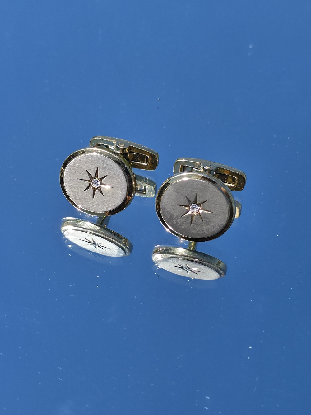 Vintage Yves Saint Laurent Gold Tone Brushed Starburst Rhinestone Cufflinks